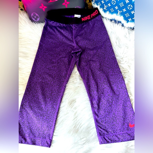 Nike Pants - EUC‎ Nike Pro Purple and Black Patterned Cropped Leggings Size M